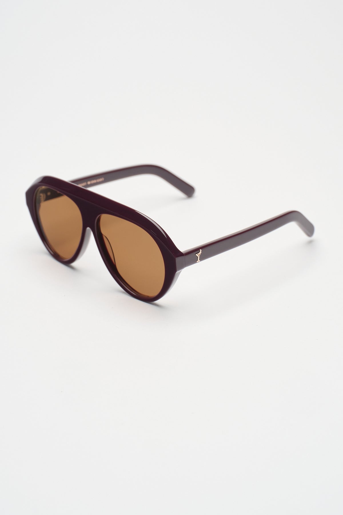Retrofête x Past Midnight The Icon Violette shield sunglasses with amber lenses, angled still life